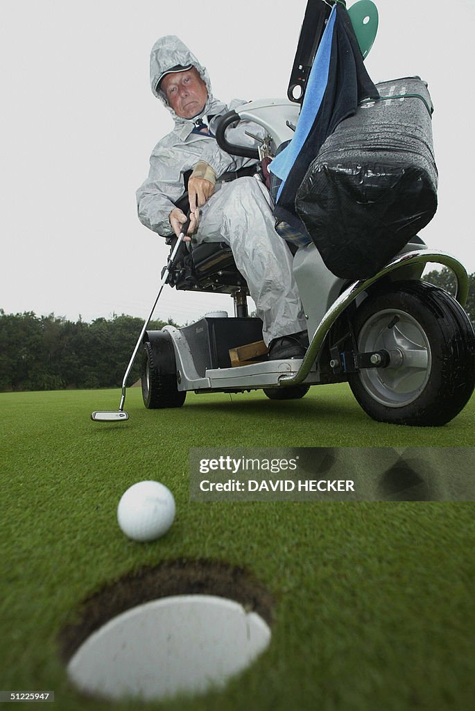 Handicapped golf player Brian Alden of E