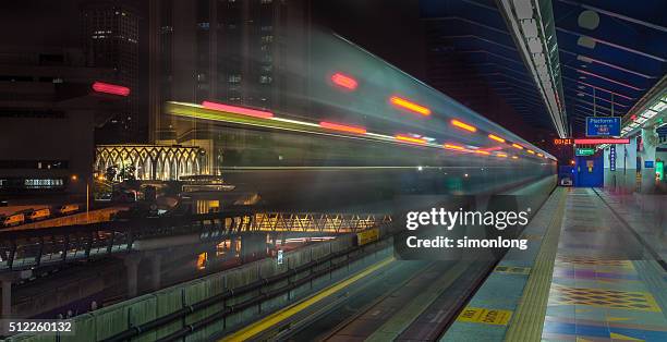 kuala lumpur night view with light trails - subway platform bildbanksfoton och bilder