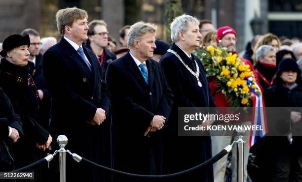 Dutch King Willem-Alexander and Amsterdam mayor Eberhard van der Laan attend on February 25, 2016 the 75th commemoration of the February 25, 1941...