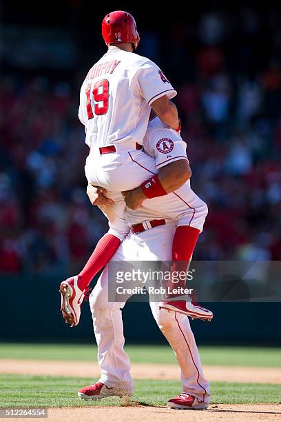 David Murphy and Albert Pujols of the Los Angeles Angels celebrate defeating the Baltimore Orioles at Angel Stadium on Sunday, August 9, 2015 in...