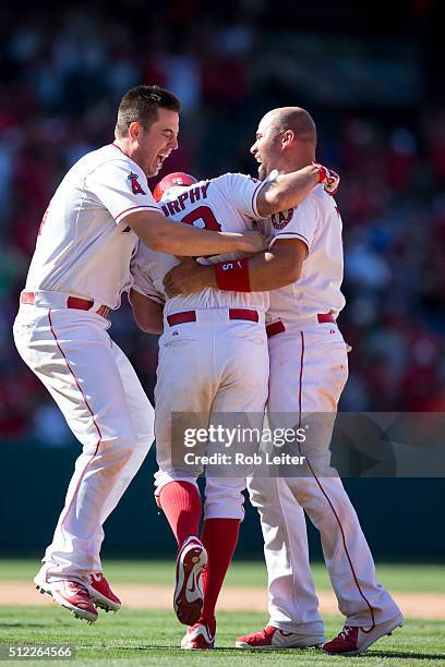 Cron, David Murphy and Albert Pujols of the Los Angeles Angels celebrate defeating the Baltimore Orioles at Angel Stadium on Sunday, August 9, 2015...