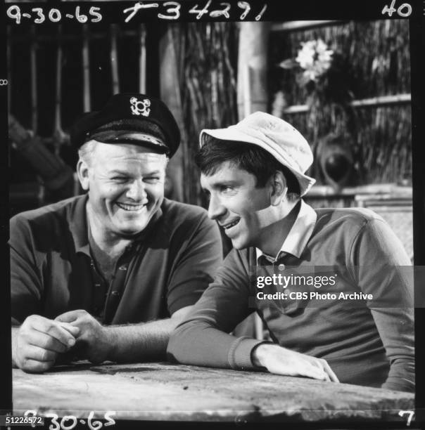 American actors Alan Hale Jr. And Bob Denver laugh on the set of the 'Gilligan's Island' episode 'Nyet, Nyet Not Yet,' Los Angeles, California,...