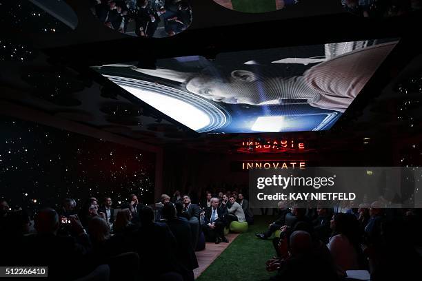 Guests attend the Axel Springer Award for Facebook founder and chief Mark Zuckerberg in Berlin on February 25, 2016 Facebook announced it was...