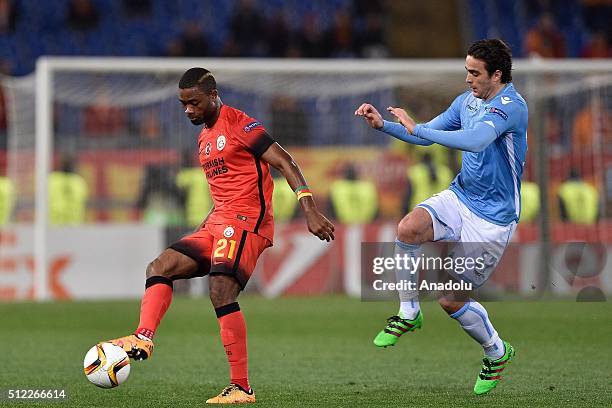 Galatasaray's Aurelien Chedjou and Lazio's Alessandro Matri in action during the UEFA Europa League, Round of 32 second leg match between SK...