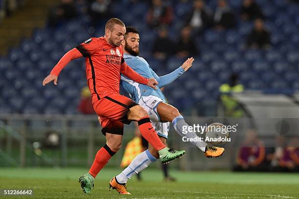 Galatasaray's Wesley Sneijder vie for the ball against Lazio's Felipe Anderson during the UEFA Europa League, Round of 32 second leg match between SK...