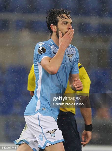 Marco Parolo of SS Lazio celebrates after scoring the opening goal during the UEFA Europa League Round of 32 second leg match between Lazio and...
