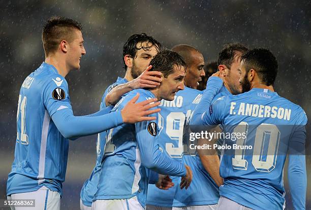 Miroslav Klose with his teammates of SS Lazio celebrates after scoring the team's third goal during the UEFA Europa League Round of 32 second leg...