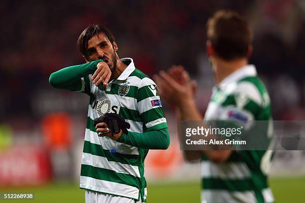 Bryan Ruiz and Joao Pereira of Sporting react after the UEFA Europa League round of 32 second leg match between Bayer Leverkusen and Sporting Lisbon...