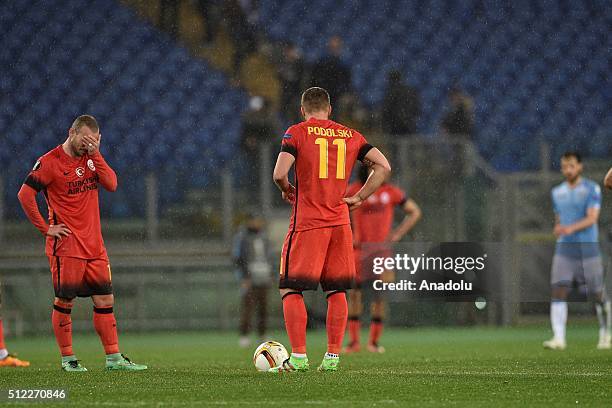 Galatasaray's Wesley Sneijder and Lukas Podolski are seen during the UEFA Europa League, Round of 32 second leg match between SK Galatasaray and SS...