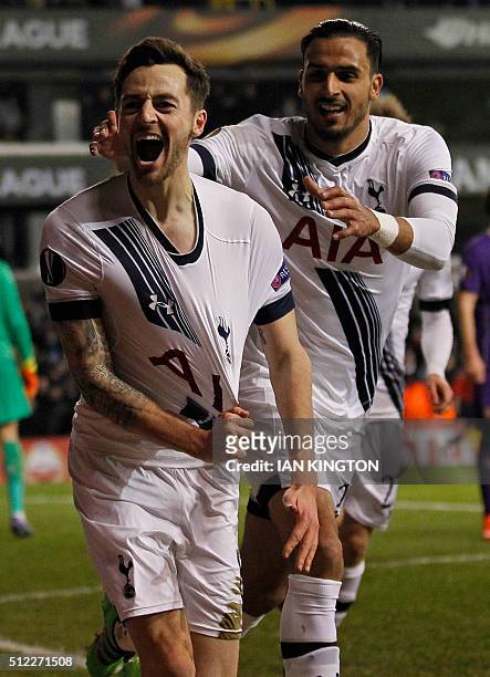 Tottenham Hotspur's English midfielder Ryan Mason celebrates scoring his team's first goal during the UEFA Europa League round of 32, second leg...