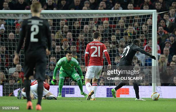 Midtjylland's Ugandan forward Pione Sisto shoots to score his team;s first goal during the UEFA Europa League round of 32, second leg football match...