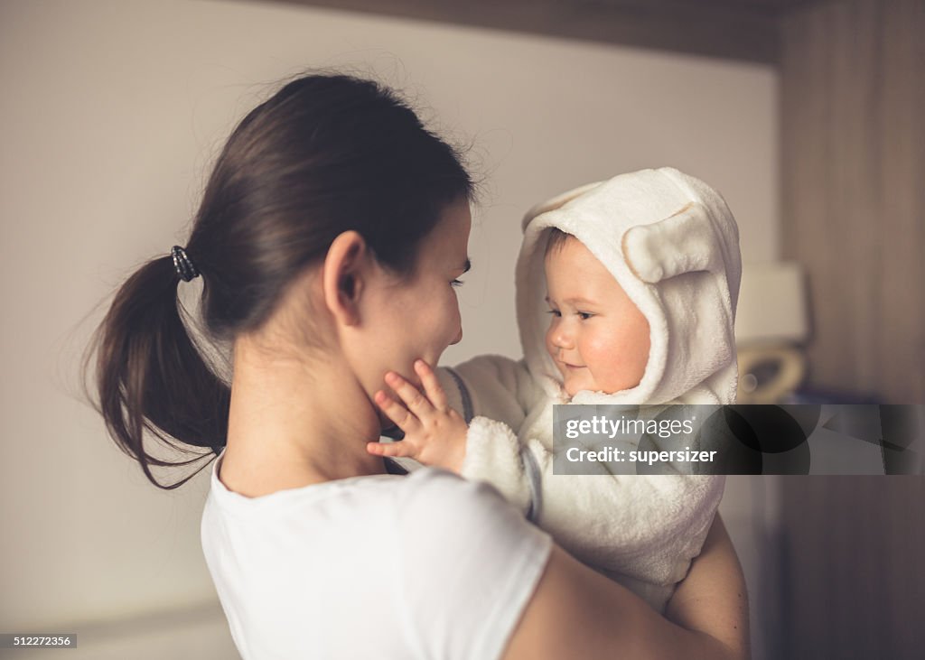 Smiling mother and baby