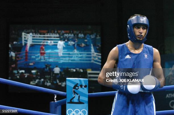 Amir Khan of Great Britain waits for the start of a round against Serik Yeleuov of Kazakhstan during their lightweight Olympic Games semi-final...