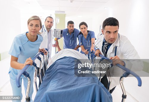 Patient Rushed Doctors Rushing With Patient At The Emergency Room High-Res Stock Photo ...