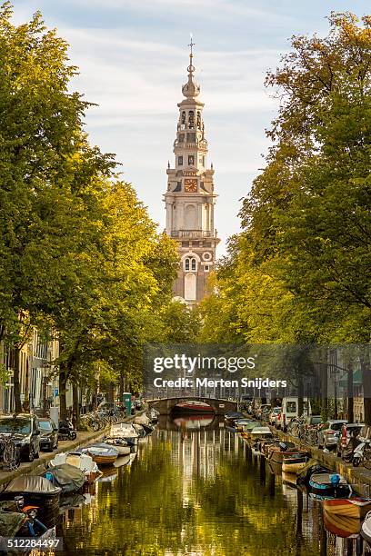 the zuiderkerk along groenburgwal - amsterdam netherlands stock pictures, royalty-free photos & images