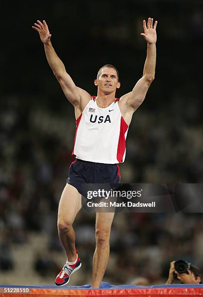Timothy Mack of USA celebrates after he won gold in the men's pole vault final on August 27, 2004 during the Athens 2004 Summer Olympic Games at the...