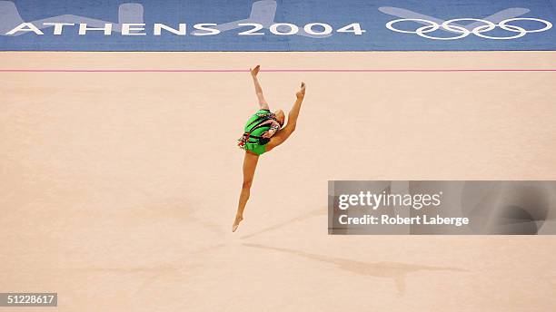 Alina Kabaeva of Russia competes in the rhythmic gymnastics individual qualifications on August 27, 2004 during the Athens 2004 Summer Olympic Games...