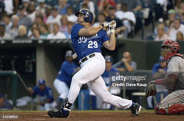 Mike Sweeney of the Kansas City Royals hits against the Anaheim Angels during the game on August 9, 2004 at Kauffman Stadium in Kansas City,...