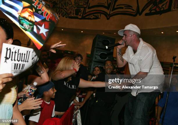 Rap artist Pitbull performs at the Virgin Megastore on August 27, 2004 in Miami, Florida.