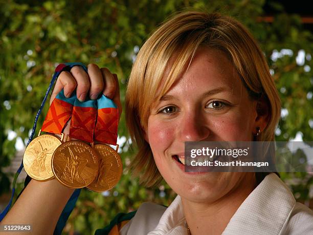 Three-time 2004 Athens Summer Olympic Swimming Gold Medalist Jodie Henry of Australia poses for a portrait August 27, 2004 on day 14 of the 2004...