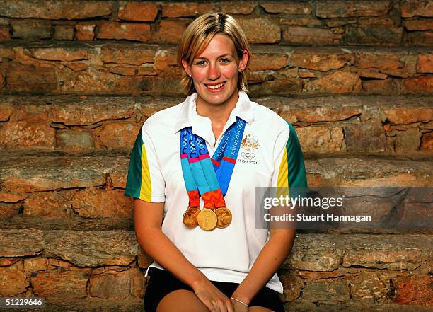 Three-time 2004 Athens Summer Olympic Swimming Gold Medalist Jodie Henry of Australia poses for a portrait August 27, 2004 on day 14 of the 2004...