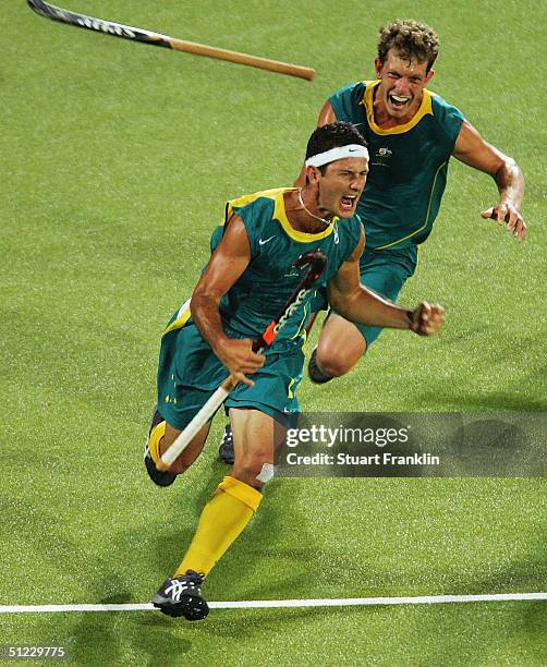 Jamie Dwyer of Australia celebrates after scoring the winning goal in men's field hockey gold medal match against the Netherlands on August 27, 2004...