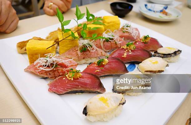 sushi plate - suchi asano stock pictures, royalty-free photos & images