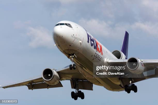 fedex express cargo jet - federal express stock pictures, royalty-free photos & images