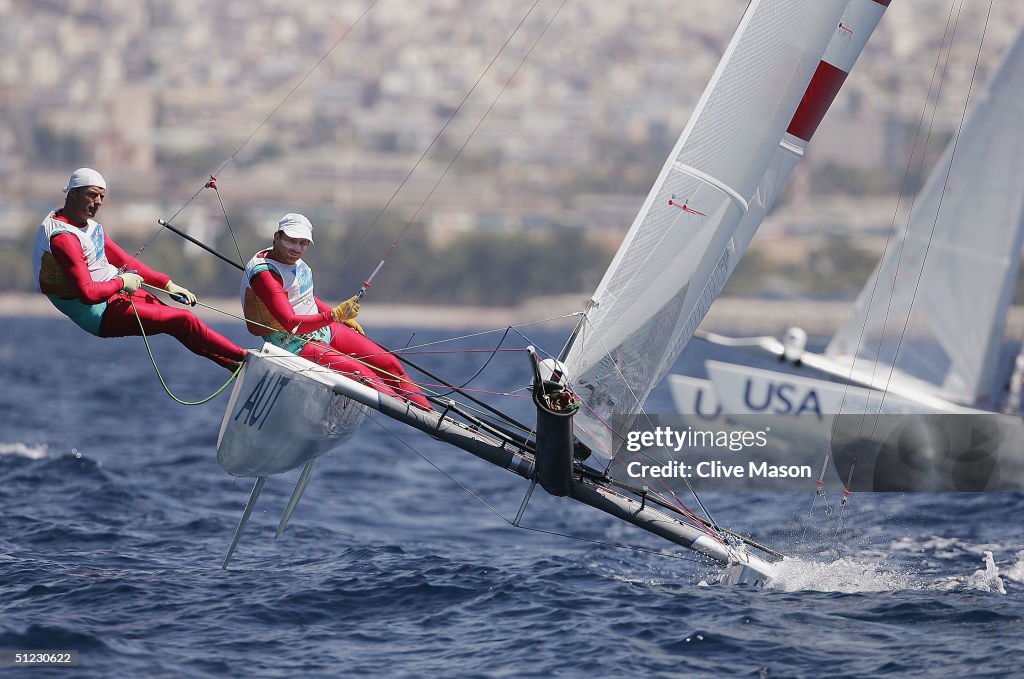 Open Multihull Hans Peter Steinacher and Roman Hagara of Austria sail their way to ...