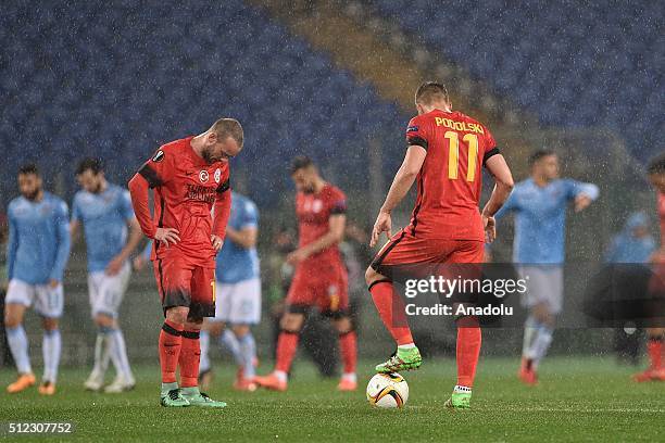 Galatasaray's Lukas Podolski and Wesley Sneijder are seen during the UEFA Europa League, Round of 32 second leg match between SK Galatasaray and SS...