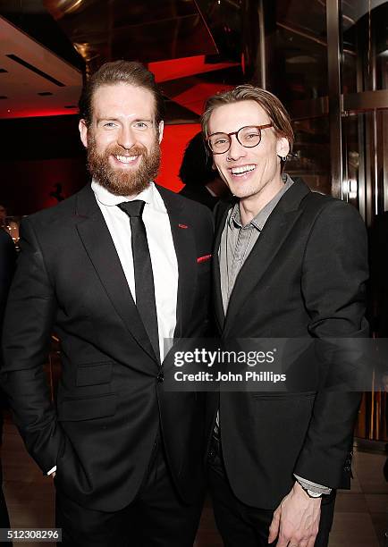 Craig McGinlay and Jamie Campbell Bower attend the UK launch of the Ferrari 488 Spider at Watches of Switzerland on February 25, 2016 in London,...