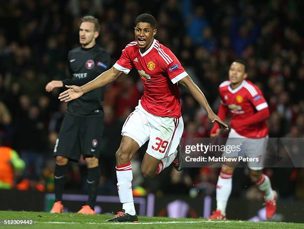 Marcus Rashford of Manchester United celebrates scoring their second goal during the UEFA Europa League match between Manchester United and FC...