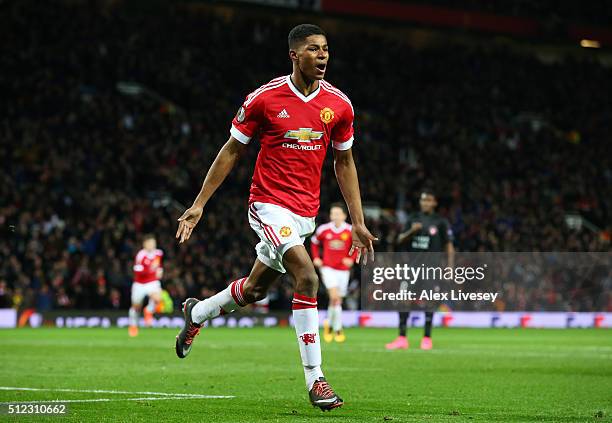 Marcus Rashford of Manchester United celebrates scoring his team's second goal during the UEFA Europa League Round of 32 second leg match between...