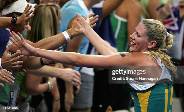 Lauren Jackson of Australia celebrates a silver medal with Australian fans after losing in the Women's Basketball gold medal game to the United...