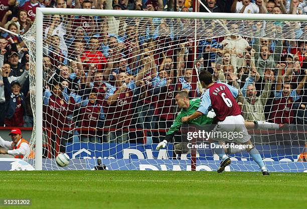 Gareth Barry, of Aston Villa scores the third goal during the Barclays Premiership match between Aston Villa and Newcastle United at Villa Park on...