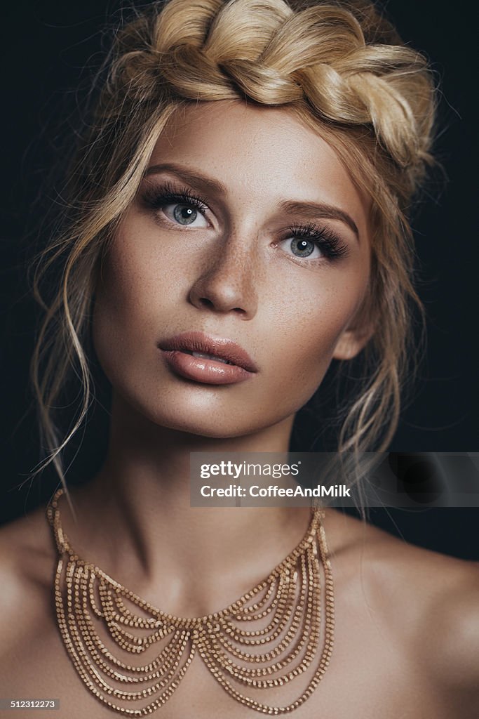 Studio shot of young beautiful woman