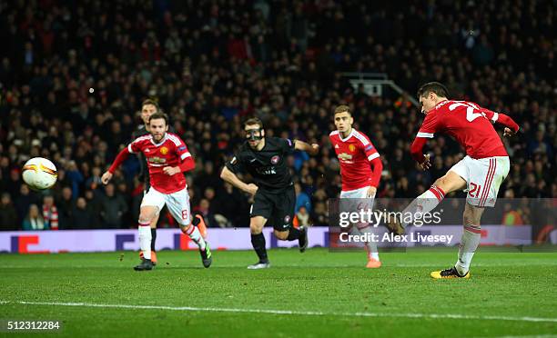 Ander Herrera of Manchester United converts the penalty to score his team's fourth goal during the UEFA Europa League Round of 32 second leg match...