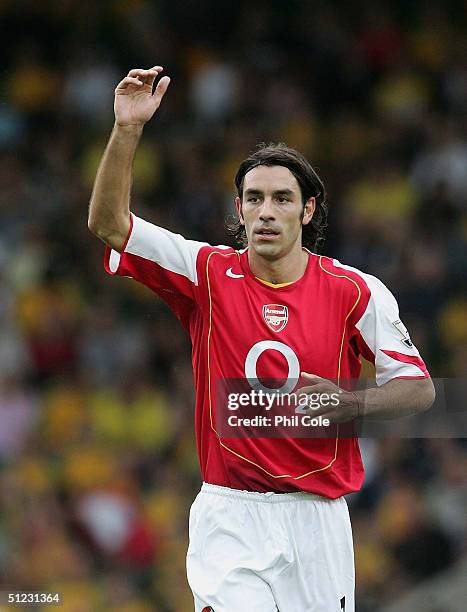 Robert Pires of Arsenal celebrates scoring during the Barclays Premiership match between Norwich City and Arsenal at Carrow Road on August 28, 2004...