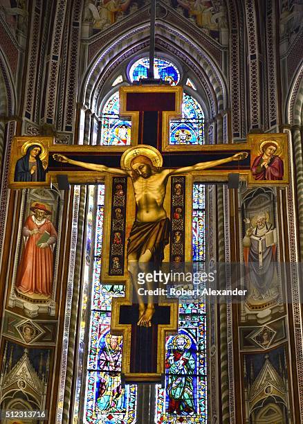 Hanging in the nave of the Basilica of Santa Croce in Florence, Italy, is the Crocifisso Cimabue, a crucifix painted by Florentine painter Cimabue in...