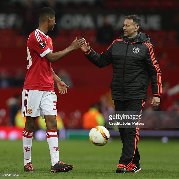 Marcus Rashford of Manchester United celebrates with Assistant Manager Ryan Giggs after the UEFA Europa League match between Manchester United and FC...