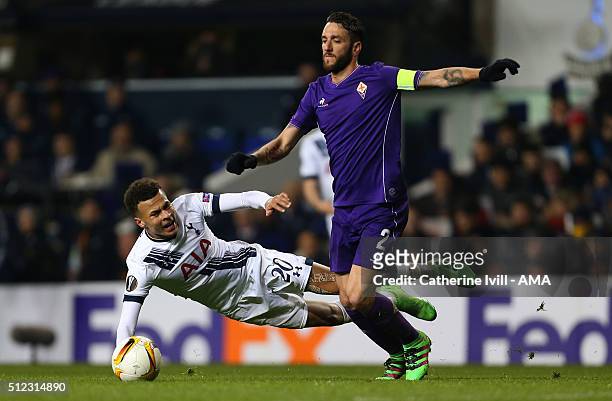 Dele Alli of Tottenham Hotspur and Gonzalo Rodriguez of Fiorentina during the UEFA Europa League match between Tottenham Hotspur and Fiorentina at...
