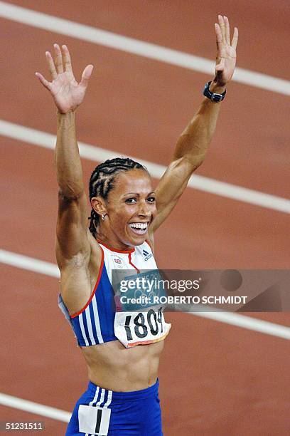 Britain's Kelly Holmes after winning the women's 1,500m final ahead of Russia's Tatyana Tomasova and Romania's Maria Cioncan at the Olympic Stadium...