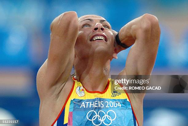 Romania's Maria Cioncan reacts after winning the bronze in the women's 1,500m final at the Olympic Stadium 28 August 2004 during the Olympic Games...
