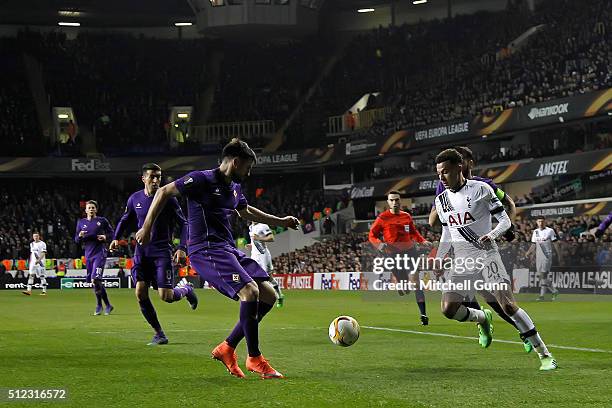 Dele Alli of Tottenham runs at the Fiorentina defence during the UEFA Europa League Round of 32 second leg match between Tottenham Hotspur and...