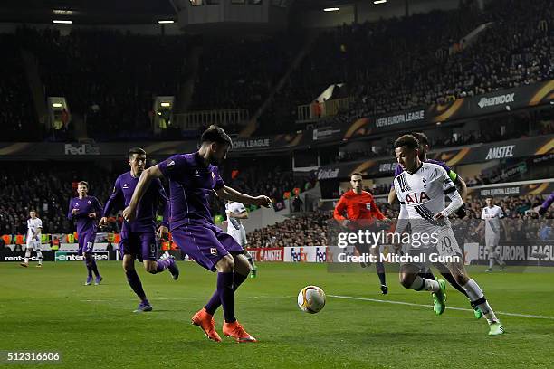 Dele Alli of Tottenham runs at the Fiorentina defence during the UEFA Europa League Round of 32 second leg match between Tottenham Hotspur and...