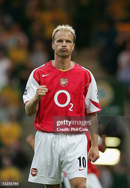 Dennis Bergkamp of Arsenal celabrates scoring during the Barclays Premiership match between Norwich City and Arsenal at Carrow Road on August 28,...