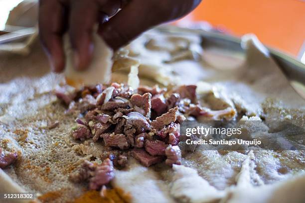 Atint Injera Eating Injera Photos and Premium High Res Pictures - Getty Images