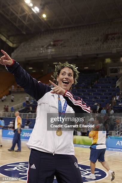 Sue Bird of USA celebrates winning gold against Australia in the women's basketball final game on August 28, 2004 during the Athens 2004 Summer...