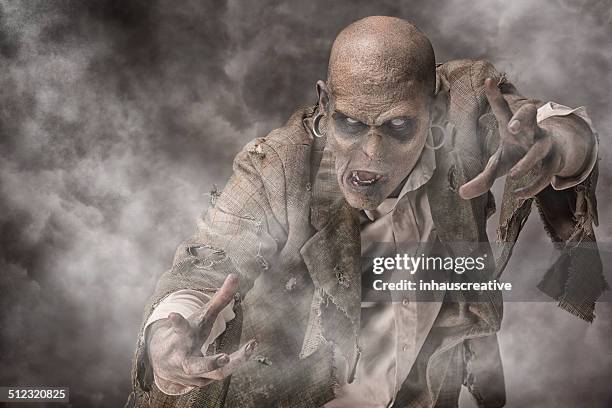 zombie in the fog - zombie stock pictures, royalty-free photos & images