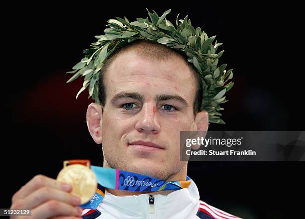 Cael Sanderson of United States receives the gold medal for the men's Freestyle wrestling 84 kg event on August 28, 2004 during the Athens 2004...